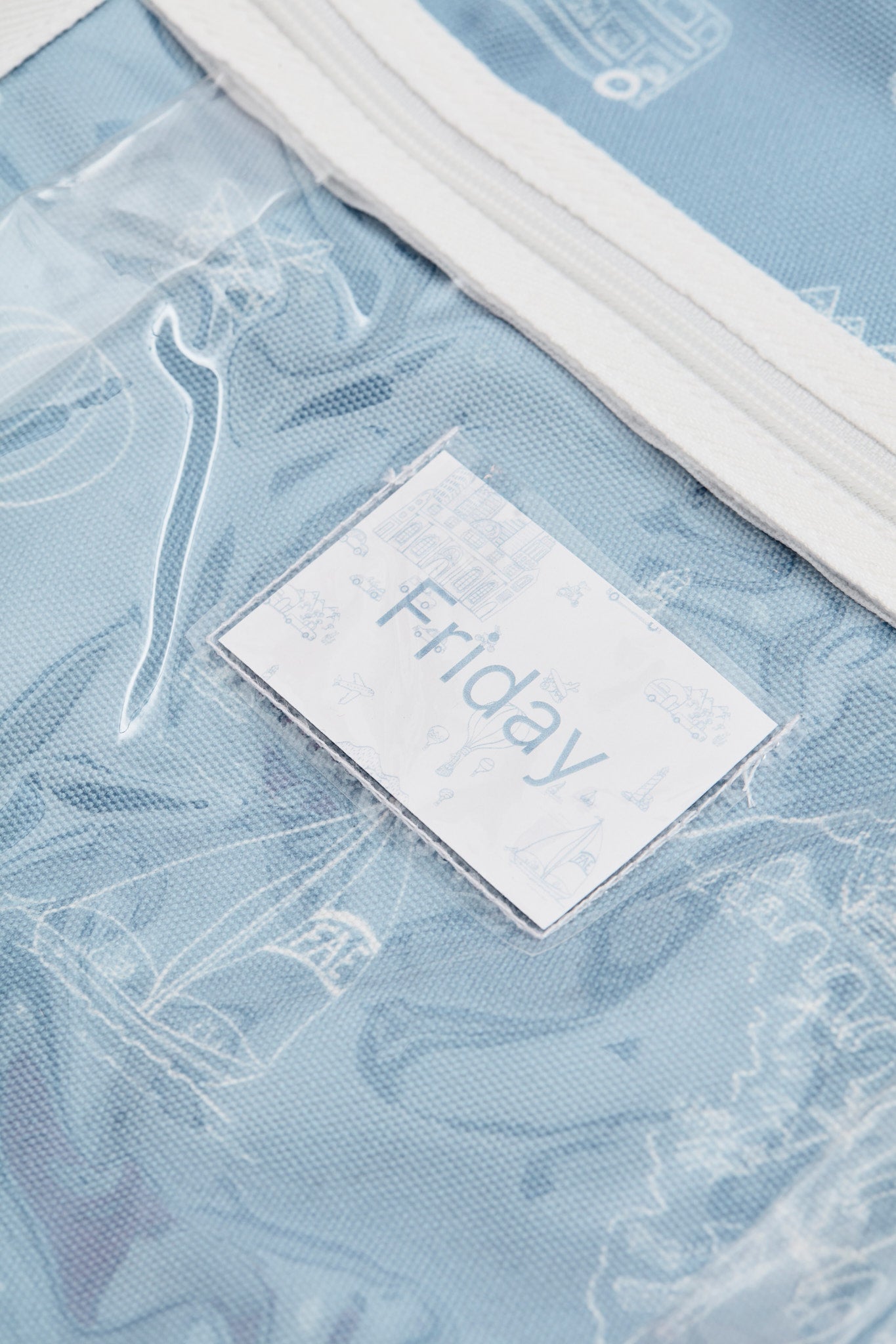 Detail of the label pockets. Friday, day of the week label.