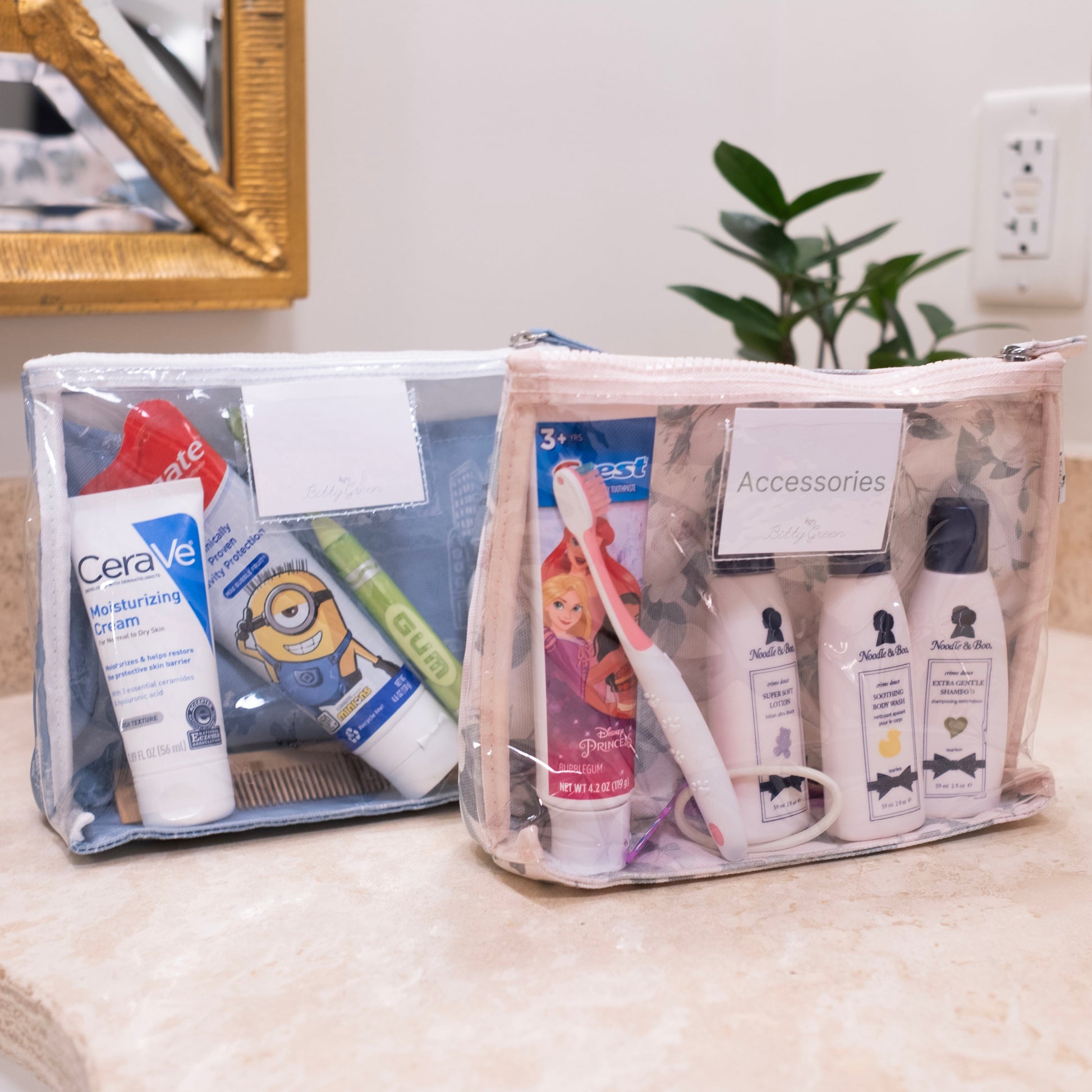 Clear travel bags with toiletries on a bathroom counter