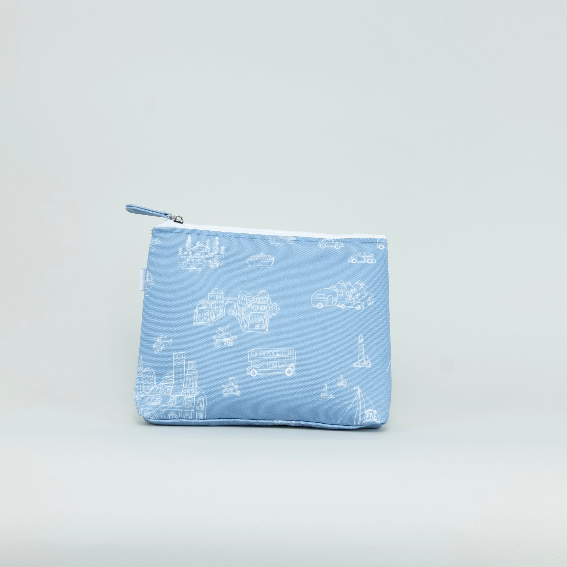 Small blue pouch with white toile pattern on a light gray background