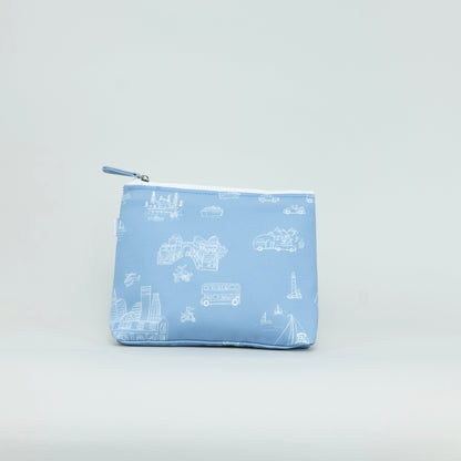Small blue pouch with white toile pattern on a light gray background